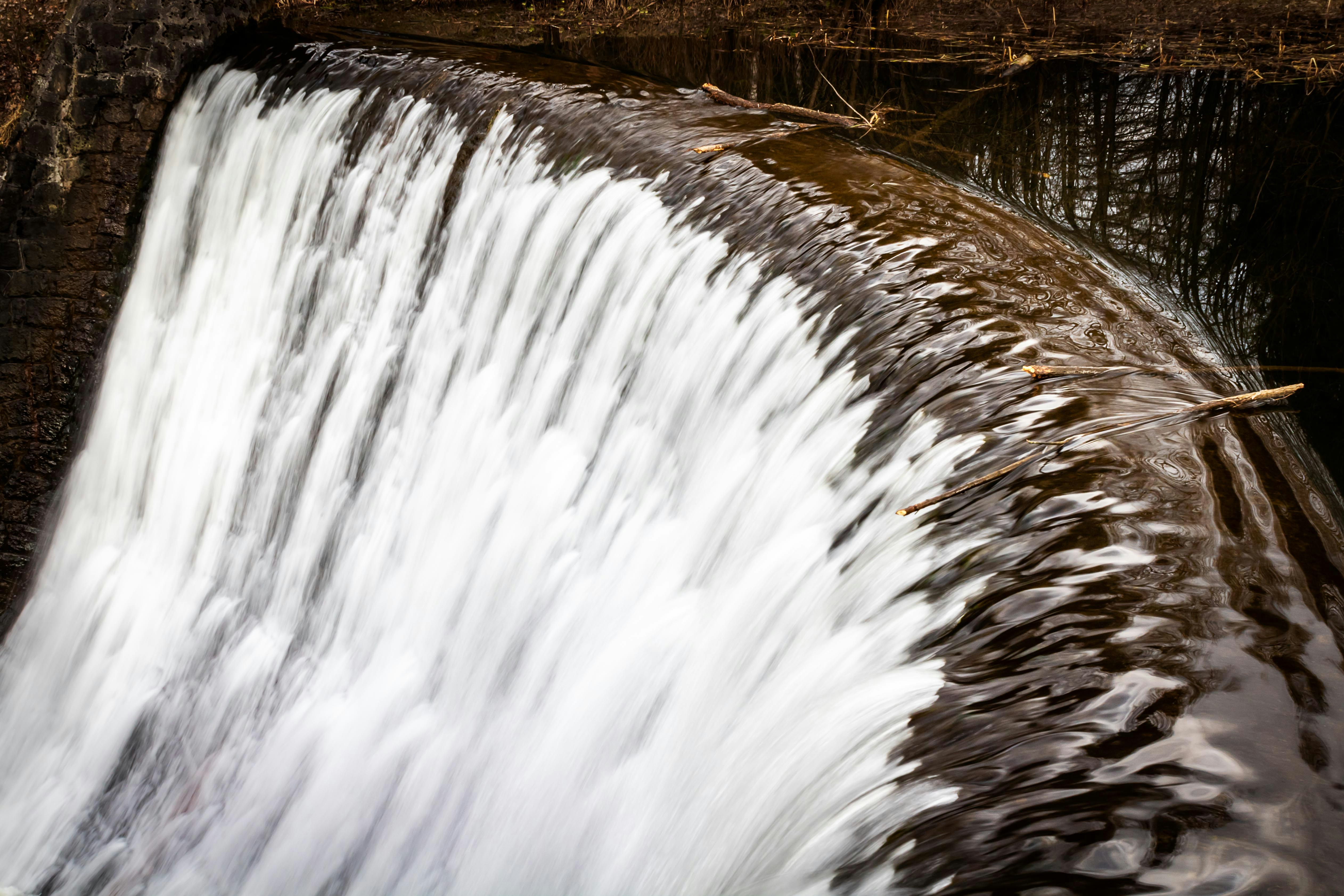 time lapse photography of waterfalls